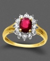 Classic and elegant with bold, beautiful color. This royalty-inspired ring features oval-cut ruby (3/4 ct. t.w.) and round-cut diamond accents set in 10k gold.