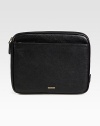 Keep your investment neatly tucked away in the handsome, textured leather case with logo detail.Zip closureExterior zip pocketLeather10W x 8HImported