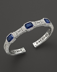 From Judith Ripka's Estate collection comes this stunning sterling silver cuff, showcasing brilliant blue corundum stones. From Judith Ripka's Estate collection comes this stunning sterling silver cuff, showcasing brilliant blue corundum stones.