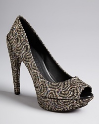 Add some swirl to your step on your next night out in these glamorous, sparkling peep toe platform pumps by evening expert Vera Wang. Add some swirl to your step on your next night out in these glamorous, sparkling peep toe platform pumps by evening expert Vera Wang.