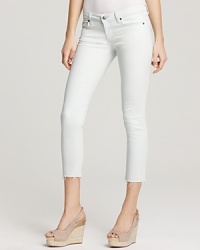 These light-wash Paige Denim skinny jeans boast frayed and cropped hems-better to show off the season's favorite footwear. These light-wash Paige Denim skinny jeans boast frayed and cropped hems-better to show off the season's favorite footwear.