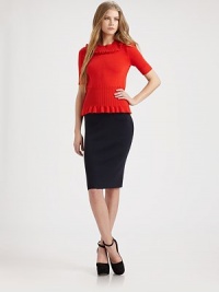 Ribbing and ruffles add pretty touches to a soft, short-sleeved pullover.Extra wide ribbed crew neckline with ruffleSlightly puffed short sleeves with ribbed cuffsBack zipperWide ribbed waistSoftly gathered lettuce-edged hemAbout 23 from shoulder to hem95% cotton/5% cashmereDry cleanImportedModel shown is 5'9½ (176cm) wearing US size Small. Ribbing and ruffles add pretty touches to a soft, short-sleeved pullover.Extra wide ribbed crew neckline with ruffleSlightly puffed short sleeves with ribbed cuffsBack zipperWide ribbed waistSoftly gathered lettuce-edged hemAbout 23 from shoulder to hem95% cotton/5% cashmereDry cleanImportedModel shown is 5'9½ (176cm) wearing US size Small.