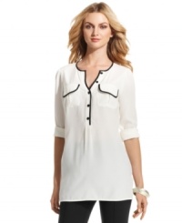 Contrasting piped trim makes this petite Alfani blouse stand apart--easily pairs with dark skinny jeans or a pencil skirt. (Clearance) Contrasting piped trim makes this petite Alfani blouse stand apart--easily pairs with dark skinny jeans or a pencil skirt. (Clearance)