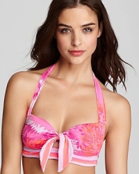 Take girlie style to the beach with this printed bikini from Nanette Lepore. In a floral print with a delicate bow, it's every bit as pretty as you. Take girlie style to the beach with this printed bikini from Nanette Lepore. In a floral print with a delicate bow, it's every bit as pretty as you.