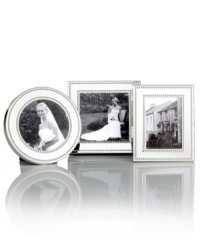 Delicately beaded edges add to the resplendent beauty of these mini Silver Bead picture frames from Martha Stewart Collection. Simply timeless in brilliant silver plate, they bring new attention to the past. Delicately beaded edges add to the resplendent beauty of these mini Silver Bead picture frames from Martha Stewart Collection. Simply timeless in brilliant silver plate, they bring new attention to the past.