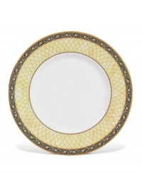 A refreshing complement to the intricate designs of the India dinnerware collection, this bone china accent plate features a warm buttercup border. A refreshing complement to the intricate designs of the India dinnerware collection, this bone china accent plate features a warm buttercup border.