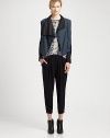 Standout style of timeless jacquard, updated by an oversized collar, contrasting leather trim and an asymmetrical front hem. Oversized collarLong sleeves with zippered cuffsAsymmetrical front hemBack ventAbout 22 from shoulder to hemBody: 80% virgin wool/20% nylonTrim: LeatherDry clean with leather specialistMade in USA of Italian fabricModel shown is 5'11 (178cm) wearing US size 4.