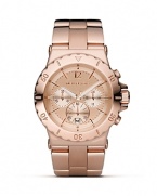 MICHAEL Michael Kors is right on time with the rose gold-plated chronograph. Featuring a three eye design, round dial and bracelet strap.