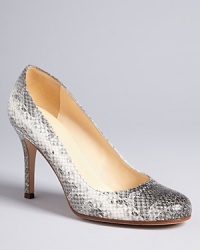 Work your work-a-day wardrobe in these kate spade new york high heel pumps, featuring wild, snake-embossed leather in a prim-and-proper silhouette. Work your work-a-day wardrobe in these kate spade new york high heel pumps, featuring wild, snake-embossed leather in a prim-and-proper silhouette.