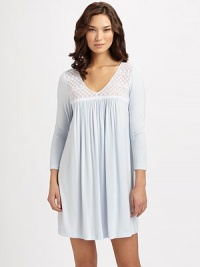 A silky-knit with a feminine-silhouette and a pretty stretch-lace neckline for the ultimate in fit and design. V-neckSemi-sheer lace yokeShirring for added drapeThree-quarter length sleevesAbout 36 from shoulder to hem95% modal/5% spandexMachine washImported A silky-knit with a feminine-silhouette and a pretty stretch-lace neckline for the ultimate in fit and design. V-neckSemi-sheer lace yokeShirring for added drapeThree-quarter length sleevesAbout 36 from shoulder to hem95% modal/5% spandexMachine washImported
