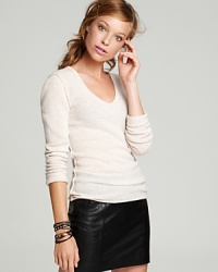 Winter winds call for the lush warmth of an Aqua Cashmere sweater and this staple style with exposed seams teams with streamlined separates for an always-winning combination. Winter winds call for the lush warmth of an Aqua Cashmere sweater and this staple style with exposed seams teams with streamlined separates for an always-winning combination.
