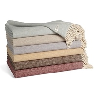 Layer on soft, luxurious warmth with this cozy, brushed cotton throw in a subtle herringbone weave. Layer on soft, luxurious warmth with this cozy, brushed cotton throw in a subtle herringbone weave.