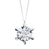 This delicate snowflake formed of sparkling Swarovski crystal lends a wintry touch to the holiday tree or window. For maximum effect, display several together.