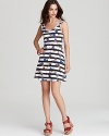 Stripes over florals are fun and flirty on this whimsical Volcom dress with a front and back scoop neckline. Optimal for your day cruising the boardwalk-wear it flip-flops or chunky wedges.