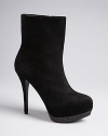 Tailored enough for work, still perfect for play, these GUESS platform booties will take you everywhere you want to go in high style.
