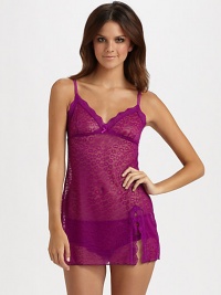 THE LOOKAdjustable shoulder straps with picot trimScalloped lace along the neckline Animal patterned fine mesh constructionSatin bow at center frontElastic Empire waist Side slit with lace trimTHE FITAbout 28 from shoulder to hemTHE MATERIALPolyamideCARE & ORIGINHand washMade in Italy THE LOOKAdjustable shoulder straps with picot trimScalloped lace along the neckline Animal patterned fine mesh constructionSatin bow at center frontElastic Empire waist Side slit with lace trimTHE FITAbout 28 from shoulder to hemTHE MATERIALPolyamideCARE & ORIGINHand washMade in Italy