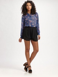 A flirty floral print meets a relaxed-fit silhouette to create a flawless blouse.Mandarin collarLong sleevesButton details on cuffsConcealed button frontBack yokeAbout 23 from shoulder to hemPolyesterDry cleanImported Model shown is 5'11 (180cm) wearing US size 4. A flirty floral print meets a relaxed-fit silhouette to create a flawless blouse.Mandarin collarLong sleevesButton details on cuffsConcealed button frontBack yokeAbout 23 from shoulder to hemPolyesterDry cleanImported Model shown is 5'11 (180cm) wearing US size 4.