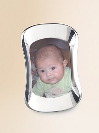 A contemporary look with graceful appeal, handcrafted in a curved silhouette from heirloom-quality alloy metal. Accommodates a 5 X 7 photograph Tarnish-resistant Wipe clean Imported A contemporary look with graceful appeal, handcrafted in a curved silhouette from heirloom-quality alloy metal. Accommodates a 5 X 7 photograph Tarnish-resistant Wipe clean Imported