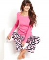 Lights out for bed! But you can keep glowing in these ultra-colorful pajamas by Jenni featuring a cozy thermal waffle knit.