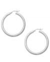 Nothing says classic style like a chic pair of hoop earrings. Studio Silver's style is crafted from thick sterling silver. Approximate diameter: 1-1/2 inches.