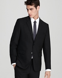 Two button, notched lapel sport coat. Front flap pockets and chest pocket. Slightly slim fit. Two button, notched lapel sport coat. Front flap pockets and chest pocket. Slightly slim fit.