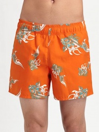 A colorful option for a dip in the pool or a day at the beach in koi-printed nylon. Elastic waist Mesh lining Inseam, about 5 Polyester Hand wash Imported A colorful option for a dip in the pool or a day at the beach in koi-printed nylon. Elastic waist Mesh lining Inseam, about 5 Polyester Hand wash Imported