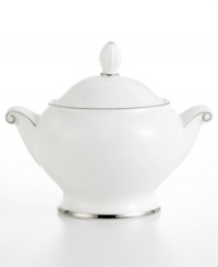 Bright fine china is simply adorned with a band of platinum for an unforgettably elegant table. The Cameo Platinum design from Mikasa's dinnerware and dishes collection is perfect for formal dinners, teas, and luncheons. This covered sugar bowl's delicate, flowing lines add a graceful touch to your table. Bright fine china is simply adorned with a band of platinum for an unforgettably elegant table. The Cameo Platinum design from Mikasa's dinnerware and dishes collection is perfect for formal dinners, teas, and luncheons. This covered sugar bowl's delicate, flowing lines add a graceful touch to your table.