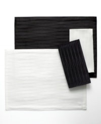 Made for celebration, the Cheers Twist napkin by Mikasa sets the scene with an understated linear pattern and dressy sheen in versatile black or white. Machine washable table linens make for an especially happy host, too. (Clearance)