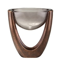 This ingenious design by Neil Cohen features a bronze-finished alloy structure, which holds a glass bowl in mid-air suspension. Perfect for serving your most delectable dips. This ingenious design by Neil Cohen features a bronze-finished alloy structure, which holds a glass bowl in mid-air suspension. Perfect for serving your most delectable dips.