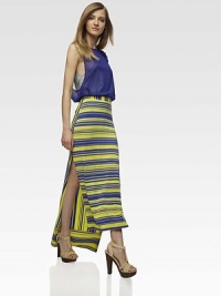 Appliqued ruffles add a touch of feminine charm to this sheer mesh topper with layered cami.ScoopneckSleevelessPullover styleCamisole includedAbout 24 from shoulder to hem94% polyester/6% elastaneDry cleanImportedModel shown is 5'9½ (176cm) wearing US size 4. Appliqued ruffles add a touch of feminine charm to this sheer mesh topper with layered cami.ScoopneckSleevelessPullover styleCamisole includedAbout 24 from shoulder to hem94% polyester/6% elastaneDry cleanImportedModel shown is 5'9½ (176cm) wearing US size 4.