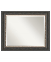 Capture the relaxed ambiance and incomparable charm of Italy's countryside with the Tuscan Rustic wall mirror. Beaded bronze trim separates the black wooden frame from beveled glass. A distressed finish commands attention in casual settings. Capture the relaxed ambiance and incomparable charm of Italy's countryside with the Tuscan Rustic wall mirror. Beaded bronze trim separates the black wooden frame from beveled glass. A distressed finish commands attention in casual settings.