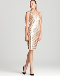 Sequined stripes shimmer on this T by Tadashi dress, a brilliantly chic option with a double v neck and a fitted, figure-flatting silhouette. Sequined stripes shimmer on this T by Tadashi dress, a brilliantly chic option with a double v neck and a fitted, figure-flatting silhouette.
