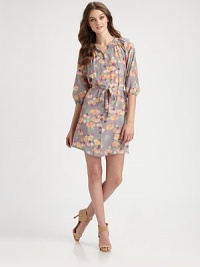 Painterly florals highlight this beautiful button-down shift in softly-hued silk.Band collarShirred necklineGathered three-quarter sleevesSelf-beltButton-down frontAbout 20 from natural waistSilkDry cleanMade in USA of imported fabricModel shown is 5'9½ (176cm) wearing US size 4. Painterly florals highlight this beautiful button-down shift in softly-hued silk.Band collarShirred necklineGathered three-quarter sleevesSelf-beltButton-down frontAbout 20 from natural waistSilkDry cleanMade in USA of imported fabricModel shown is 5'9½ (176cm) wearing US size 4.