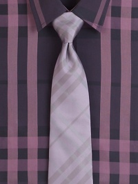 The iconic check pattern is rendered with tonal color in gently woven silk.Mulberry silkDry cleanMade in Italy