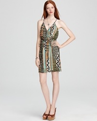 Go global and slip into this Charlie Jade tribal print dress, marrying a sporty racerback with boho braided accents. Bringing a runway trend to the office, this fashion-forward look takes you out after hours in swift style. Go global and slip into this Charlie Jade tribal print dress, marrying a sporty racerback with boho braided accents. Bringing a runway trend to the office, this fashion-forward look takes you out after hours in swift style.