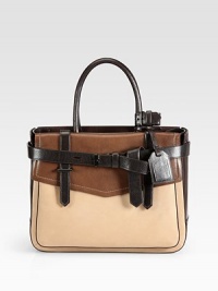 An elegant and sturdy style in brushed, glove tanned leather with a colorblocked design.Double top handles, 6 dropOpen topOne outside open pocketOne outside flap pocketTwo inside zip pocketsTwo inside open pocketsDetachable luggage tagCotton lining12¾W X 10H X 4DImported An elegant and sturdy style in brushed, glove tanned leather with a colorblocked design.Double top handles, 6 dropOpen topOne outside open pocketOne outside flap pocketTwo inside zip pocketsTwo inside open pocketsDetachable luggage tagCotton lining12¾W X 10H X 4DImported