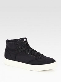 Sleek and modern defines this sport-inspired design, rendered in rich suede with a contrasting rubber sole to complete your casual-cool look with confidence.Suede/leather upperLeather liningPadded insoleRubber soleImported Sleek and modern defines this sport-inspired design, rendered in rich suede with a contrasting rubber sole to complete your casual-cool look with confidence.Suede/leather upperLeather liningPadded insoleRubber soleImported