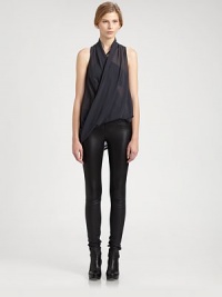 Expertly cut and draped, this silk-like top features a crossover v-neck and hi-lo hem. Crossover v-neckSleevelessDraped hi-lo hemPolyesterDry cleanMade in USA of Italian fabricModel shown is 5'10 (177cm) wearing US size Small. Expertly cut and draped, this silk-like top features a crossover v-neck and hi-lo hem. Crossover v-neckSleevelessDraped hi-lo hemPolyesterDry cleanMade in USA of Italian fabricModel shown is 5'10 (177cm) wearing US size Small.