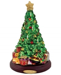 As festive as a real fir, the Lavish Tree figurine is elaborately hand painted in red, gold and glitter. Brilliant wrapped packages add to the cheerful scene from Christopher Radko. As festive as a real fir, the Lavish Tree figurine is elaborately hand painted in red, gold and glitter. Brilliant wrapped packages add to the cheerful scene from Christopher Radko.