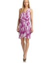 THE LOOKIkat print on sheer chiffon overlayDeep surplice v-neck with pleatsTonal v-neck under layerSleevelessElastic waistDraped faux wrap skirtRacerbackTHE FITAbout 37 from shoulder to hemTHE MATERIALPolyesterFully linedCARE & ORIGINHand wash or dry cleanImportedModel shown is 5'11 (180cm) wearing US size Small. 