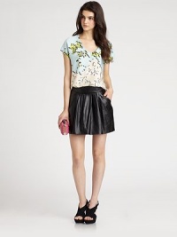 A deep, pleated scoopneck with self-tie front define this airy silk blouse.Pleated scoopneckBracelet sleevesSelf-tie frontRound hemAbout 25 from shoulder to hemSilk/SpandexDry cleanImportedModel shown is 5'10 (177cm) wearing US size Small. A deep, pleated scoopneck with self-tie front define this airy silk blouse.Pleated scoopneckBracelet sleevesSelf-tie frontRound hemAbout 25 from shoulder to hemSilk/SpandexDry cleanImportedModel shown is 5'10 (177cm) wearing US size Small.