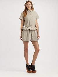 Crisp cotton poplin, tailored with delicate pintucks and sculptural split-cuff short sleeves.Shirt collarButton frontShort sleeves with split cuffs and button detailsFront pintucksPatch pocketsAbout 25 from shoulder to hemCottonDry cleanImportedModel shown is 5'11 (180cm) wearing US size 4. Crisp cotton poplin, tailored with delicate pintucks and sculptural split-cuff short sleeves.Shirt collarButton frontShort sleeves with split cuffs and button detailsFront pintucksPatch pocketsAbout 25 from shoulder to hemCottonDry cleanImportedModel shown is 5'11 (180cm) wearing US size 4.