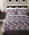 Turn over a new leaf. A dramatic red and purple allover leaf pattern adorns the Shadows comforter set for a look that stands out in any bedroom. White sheets and pillowcases feature a stenciled pattern of leaves, softening the bold tones of the comforter and shams.