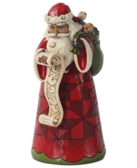 Ready to spread Christmas cheer, Santa is back at his list, checking it twice and getting ready to give toys to the nice. This folk-inspired figurine adds whimsical detailing, like a contrasting geometric design, to Santa's traditional getup. Ready to spread Christmas cheer, Santa is back at his list, checking it twice and getting ready to give toys to the nice. This folk-inspired figurine adds whimsical detailing, like a contrasting geometric design, to Santa's traditional getup.