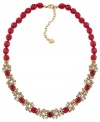 Paint the town red in this frontal necklace from Carolee. Crafted from gold-tone mixed metal, it's truly the red glass faceted beads that enhance the style. Approximate length: 16 inches.