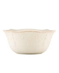 With fanciful beading and a feminine edge, this bowl from the Lenox French Perle white dinnerware collection has an irresistibly old-fashioned sensibility. Hard-wearing stoneware is dishwasher safe and, in a soft white hue with antiqued trim, a graceful addition to every meal.
