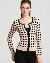 Dotted octagons lend a geometric-meets-ladylike look to Trina Turk's printed wool cardigan--a jeweled neckline shows off subtle sparkle. Dotted octagons lend a geometric-meets-ladylike look to Trina Turk's printed wool cardigan--a jeweled neckline shows off subtle sparkle.