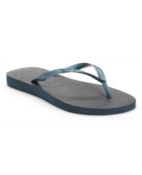 You can't go wrong with the classic cushioned flip flop! These slim sandals by Havaianas continue the tradition with a flat footbed and colorful thong strap. You can't go wrong with the classic cushioned flip flop! These slim sandals by Havaianas continue the tradition with a flat footbed and colorful thong strap.