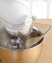 Less mess means less stress. This handy pouring shield attachment for your KitchenAid stand mixer, made of rugged plastic with a new single piece design, helps pour ingredients and prevent messes while baking. The innovative shape creates a chute that channels ingredients directly into the bowl and minimizes splatter. Lifetime warranty. Less mess means less stress. This handy pouring shield attachment for your KitchenAid stand mixer, made of rugged plastic with a new single piece design, helps pour ingredients and prevent messes while baking. The innovative shape creates a chute that channels ingredients directly into the bowl and minimizes splatter. Lifetime warranty.