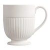 Edme mug by Wedgwood. Wedgwood marks the 100th anniversary of its classic Edme collection with a refreshing update of its timeless pattern. A new antique white glaze enhances the elegant colannade embossment and laurel motif accent pieces. Sophisticated shapes and generously sized pieces make this pattern ideal for today's lifestyle.